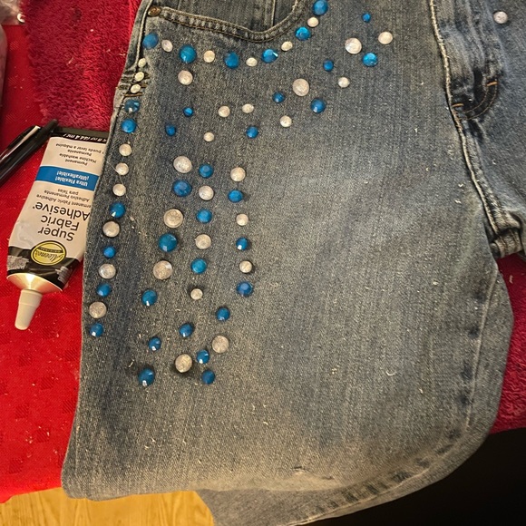 Blue denim jeans w/ blue and clear jewels. machine wash cold.Do not use dryer.. - Picture 2 of 3